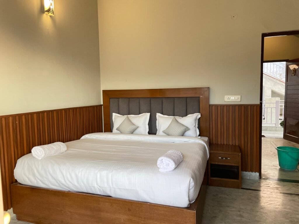 Elegant bedroom with wooden details and comfortable bedding