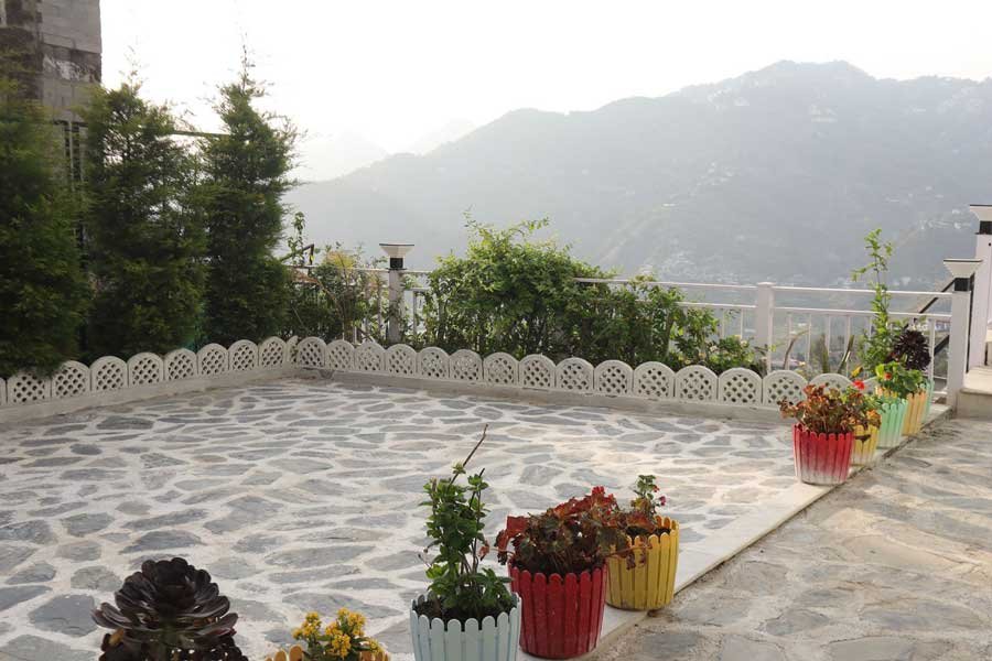 Experience the magic of the Himalayas from a stunning mountain-view terrace
